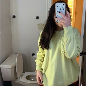 yellow sweater